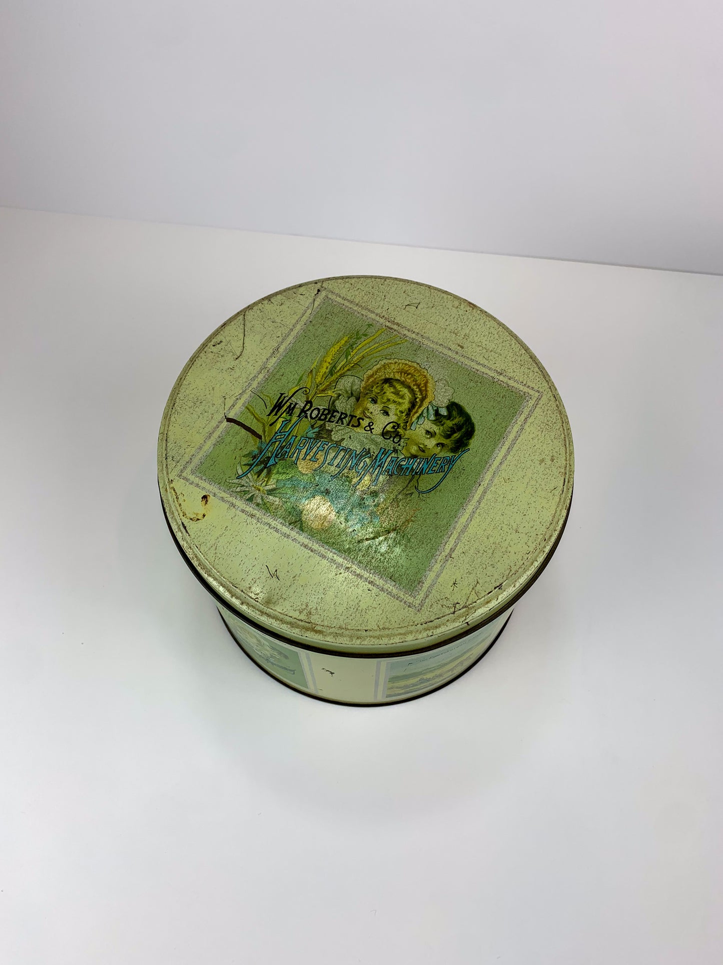 Vintage Round Metal Advertising Tin - WM Roberts & Co. Harvesting Machinery - Made In Italy