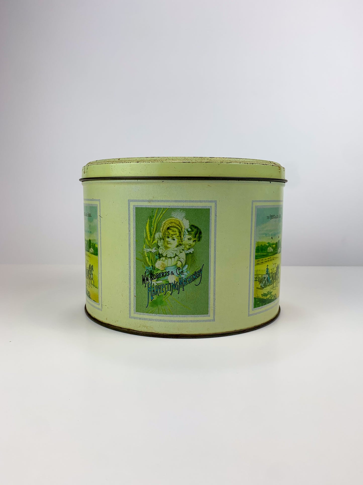 Vintage Round Metal Advertising Tin - WM Roberts & Co. Harvesting Machinery - Made In Italy