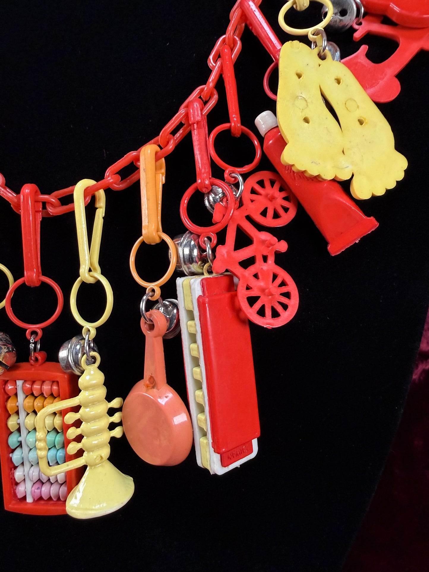 Vintage 1980s Plastic Chain Charm Necklace - 17 Bell Charms - Red Orange Yellow