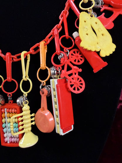 Vintage 1980s Plastic Chain Charm Necklace - 17 Bell Charms - Red Orange Yellow