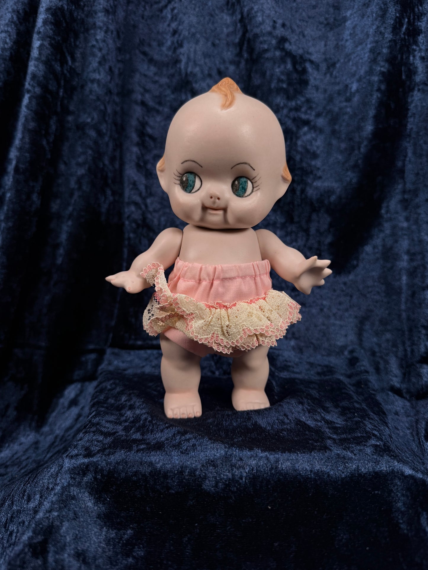 Vintage Bisque Ceramic Kewpie Doll – Posable Figure with Pink Lace Dress
