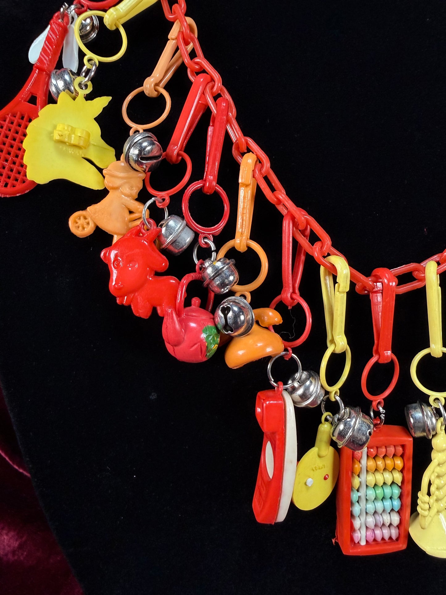 Vintage 1980s Plastic Chain Charm Necklace - 17 Bell Charms - Red Orange Yellow