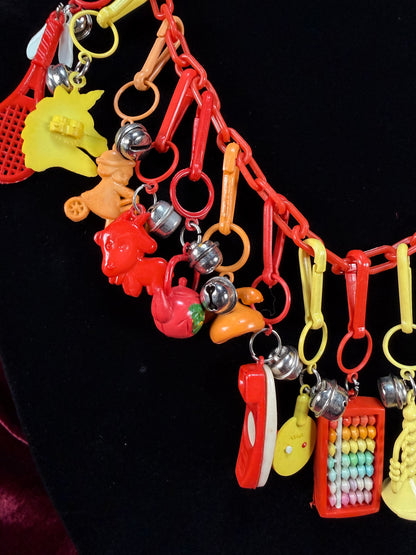 Vintage 1980s Plastic Chain Charm Necklace - 17 Bell Charms - Red Orange Yellow