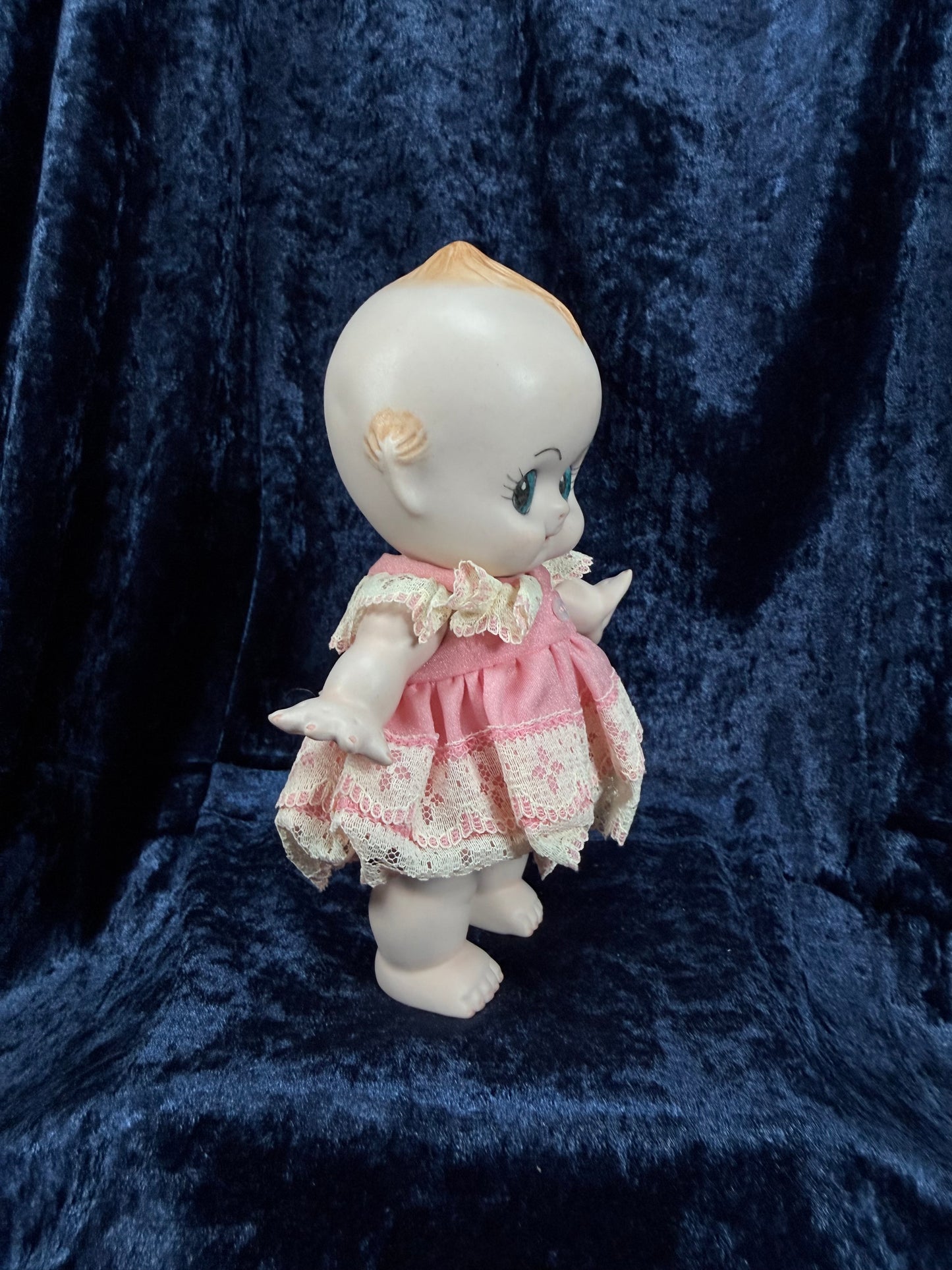 Vintage Bisque Ceramic Kewpie Doll – Posable Figure with Pink Lace Dress