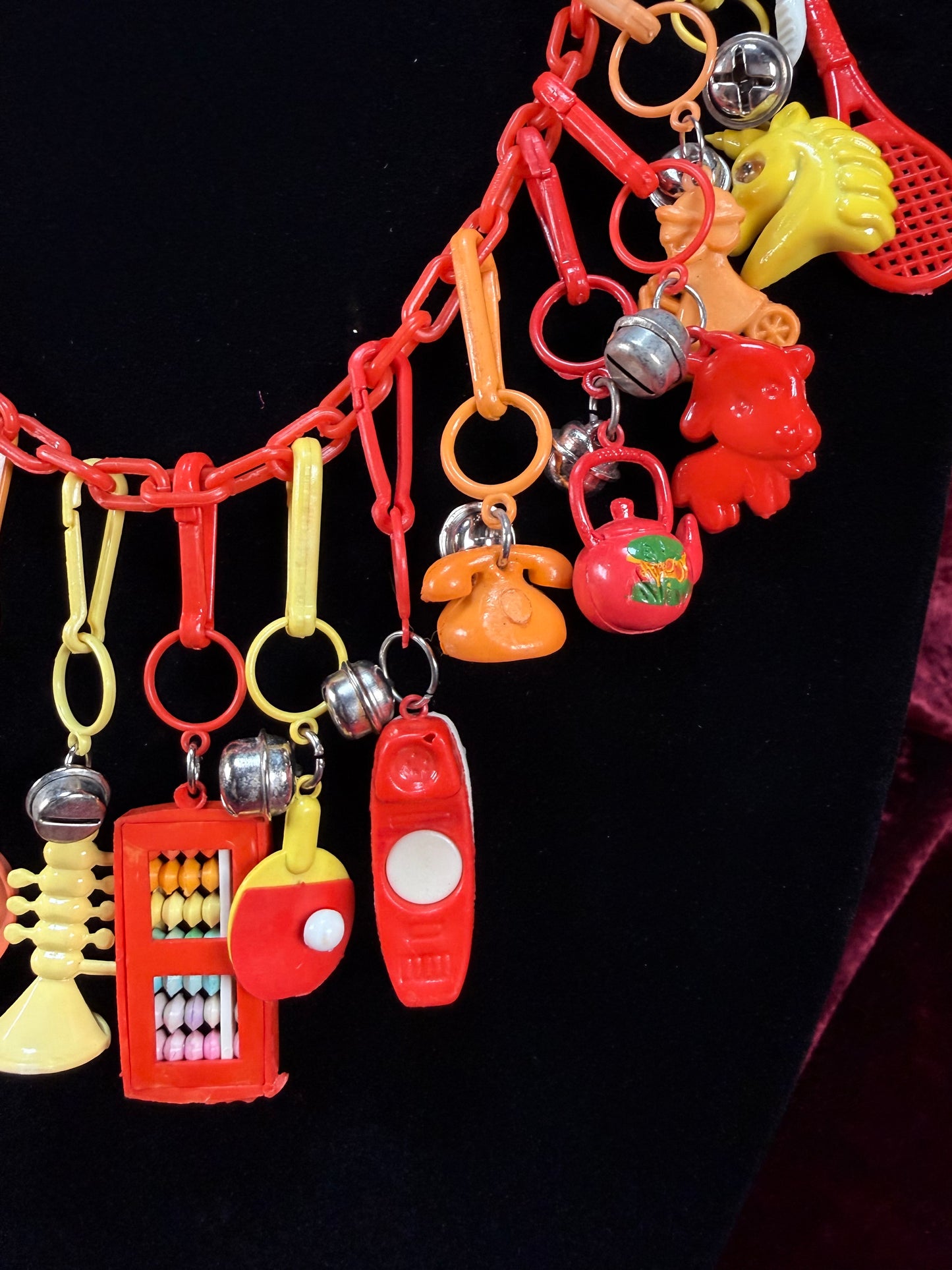 Vintage 1980s Plastic Chain Charm Necklace - 17 Bell Charms - Red Orange Yellow