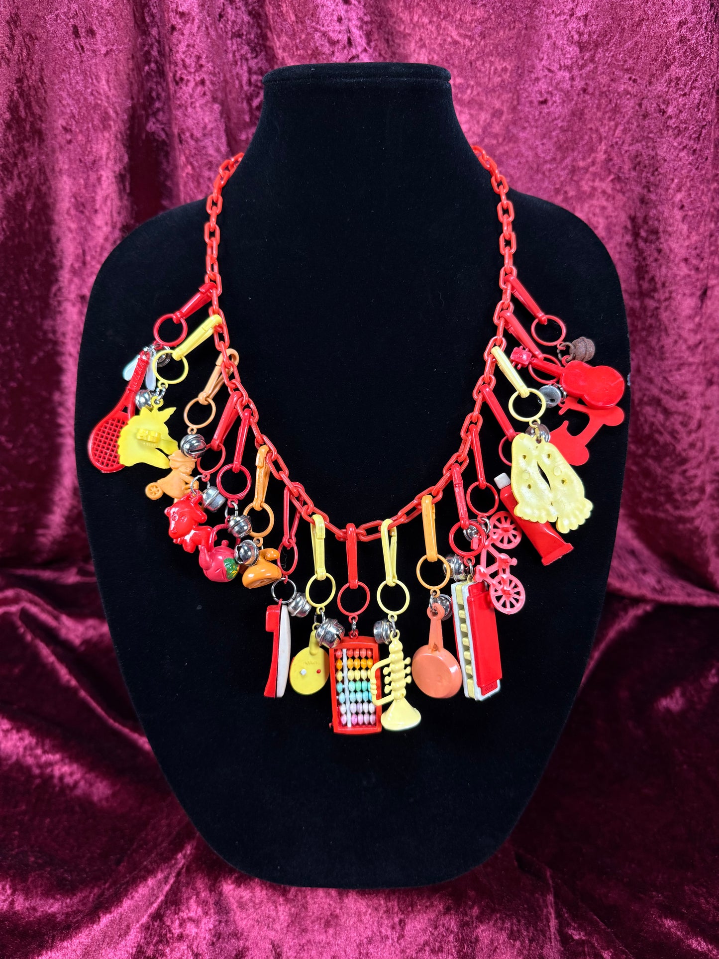 Vintage 1980s Plastic Chain Charm Necklace - 17 Bell Charms - Red Orange Yellow