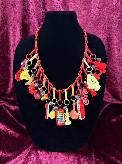 Vintage 1980s Plastic Chain Charm Necklace - 17 Bell Charms - Red Orange Yellow