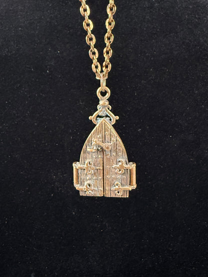 Vintage Jewelry - Brass Gothic Locket - Hinged Doors with Sword Against Time