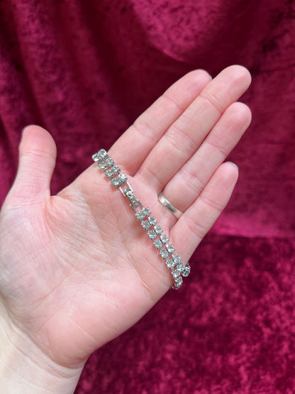 Vintage Jewelry - Tennis Bracelet - Round Cut Clear Rhinestones - Flower Center - 6.75"