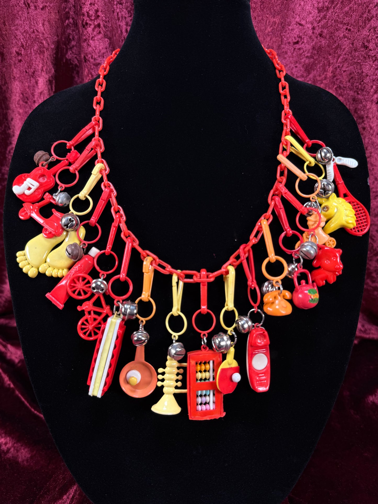 Vintage 1980s Plastic Chain Charm Necklace - 17 Bell Charms - Red Orange Yellow