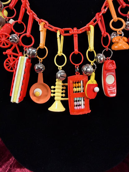 Vintage 1980s Plastic Chain Charm Necklace - 17 Bell Charms - Red Orange Yellow