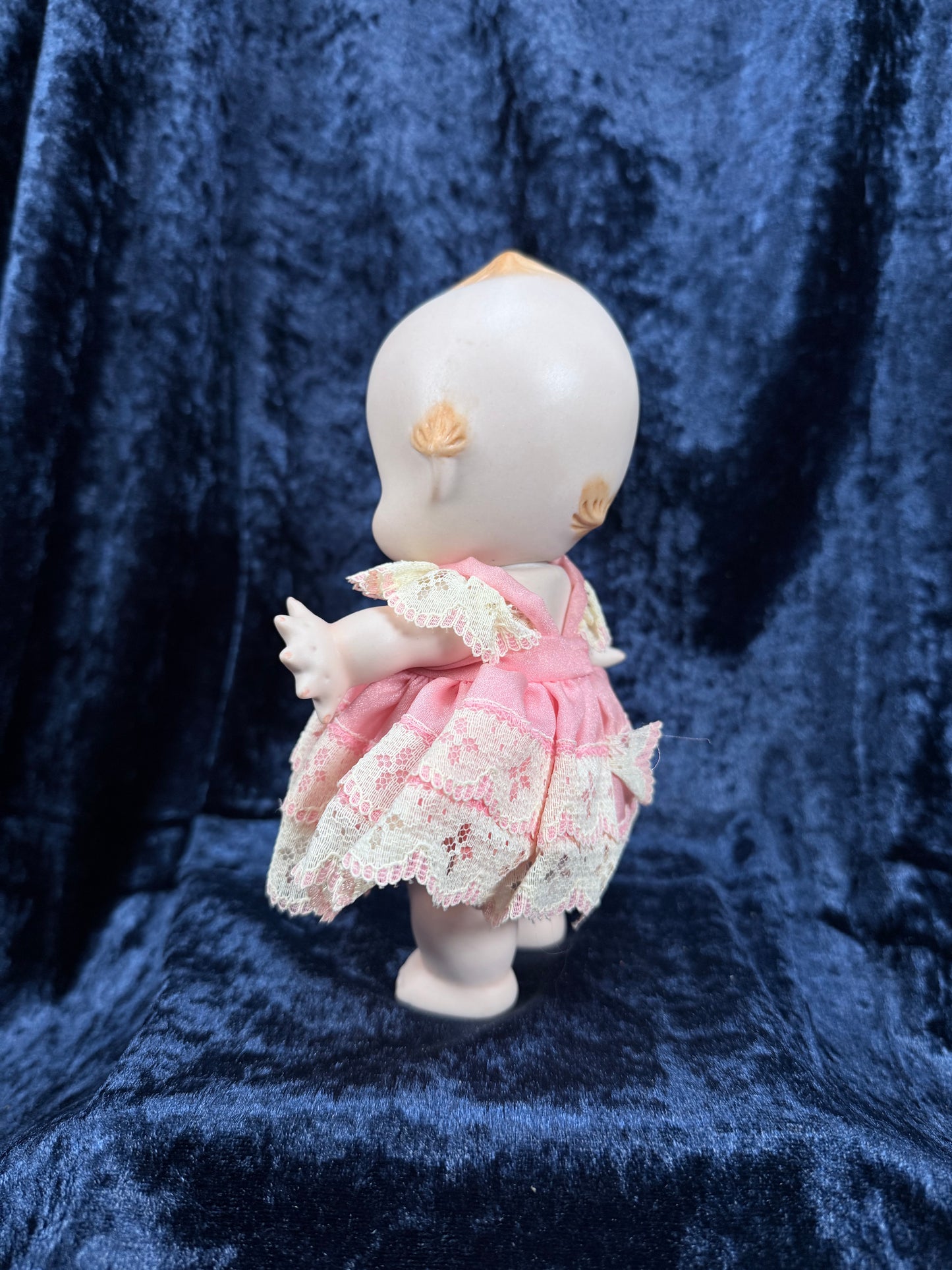Vintage Bisque Ceramic Kewpie Doll – Posable Figure with Pink Lace Dress