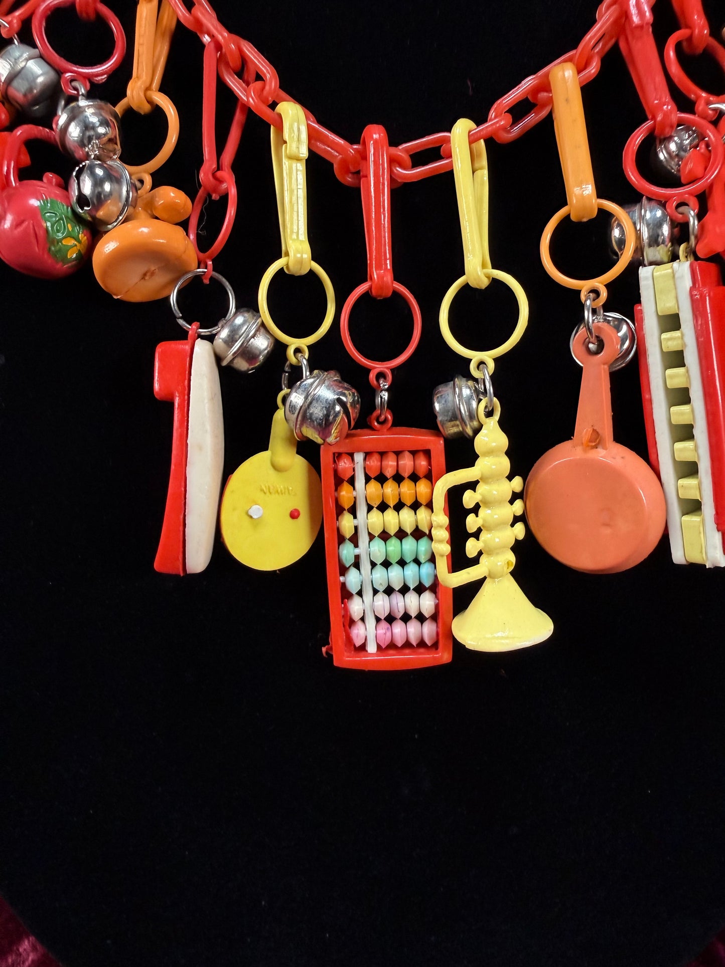 Vintage 1980s Plastic Chain Charm Necklace - 17 Bell Charms - Red Orange Yellow