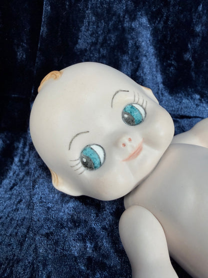 Vintage Bisque Ceramic Kewpie Doll – Posable Figure with Pink Lace Dress