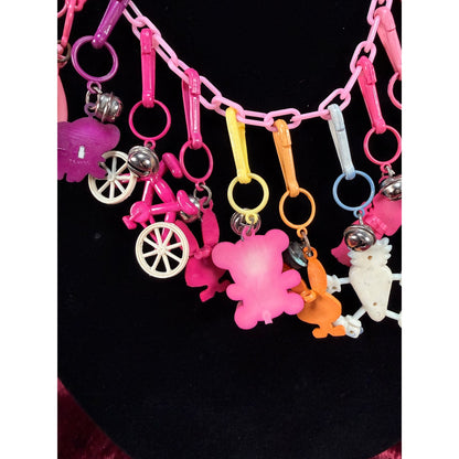 Vintage 1980s Plastic Chain Charm Necklace 12 Bell Googly Eyes Charm Pink Purple